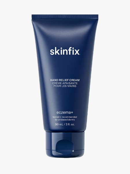 Skinfix Eczema+ Hand Relief Cream navy tube on light gray background