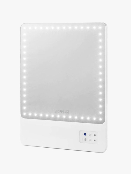 Riki Loves Riki 5X Skinny Lighted Mirror mirror with lights and white base on light grey background